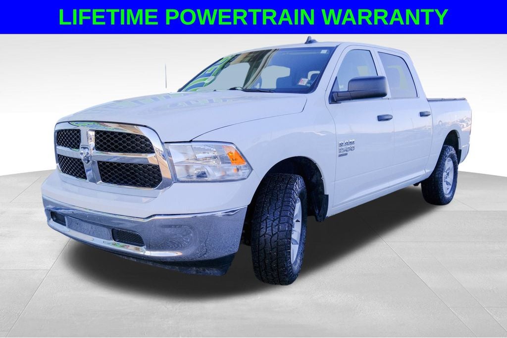 2023 RAM 1500 Classic SLT in Bright White Clearcoat — front three-quarter view